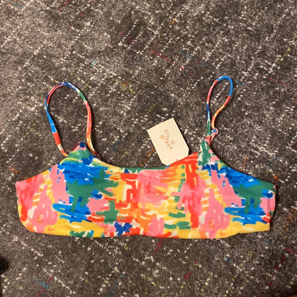 A colorful bikini top that’s very comfortable never worn and super cute!